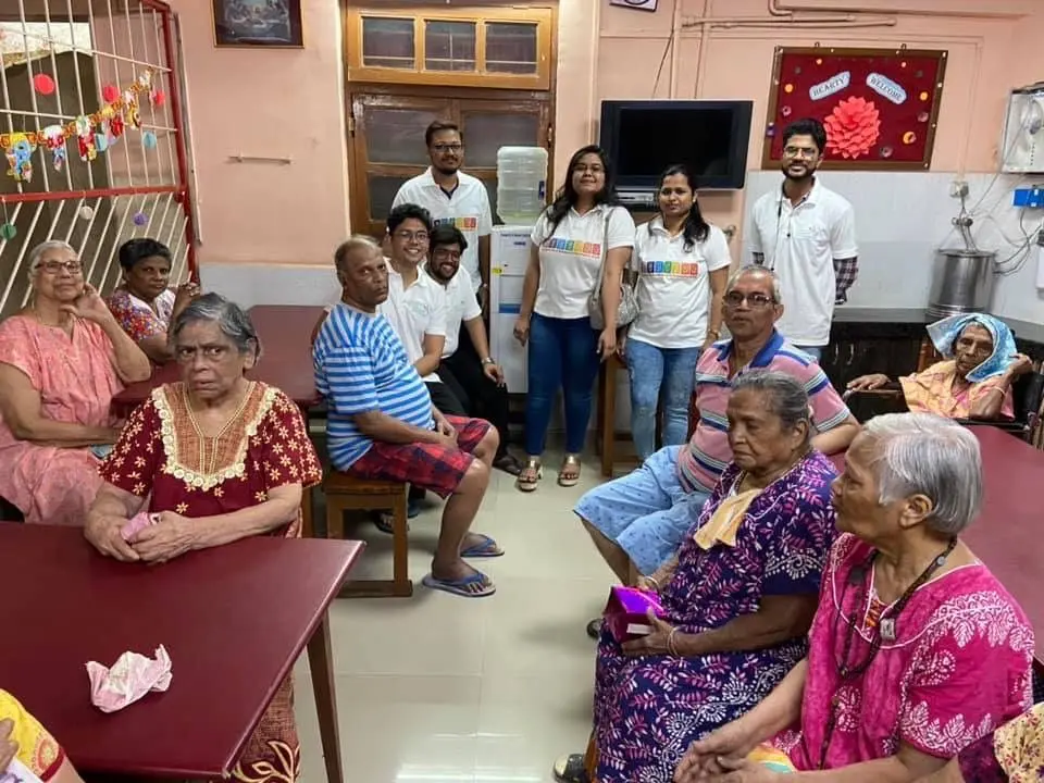 Trust volunteers visiting residents at a home for the aged