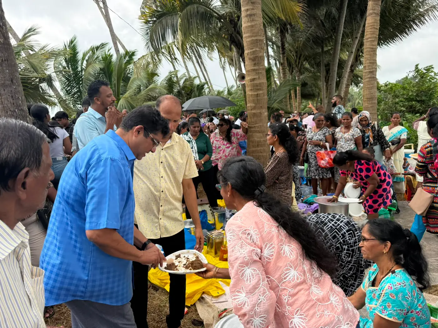 Local families joining together in devotion at Handi Cross