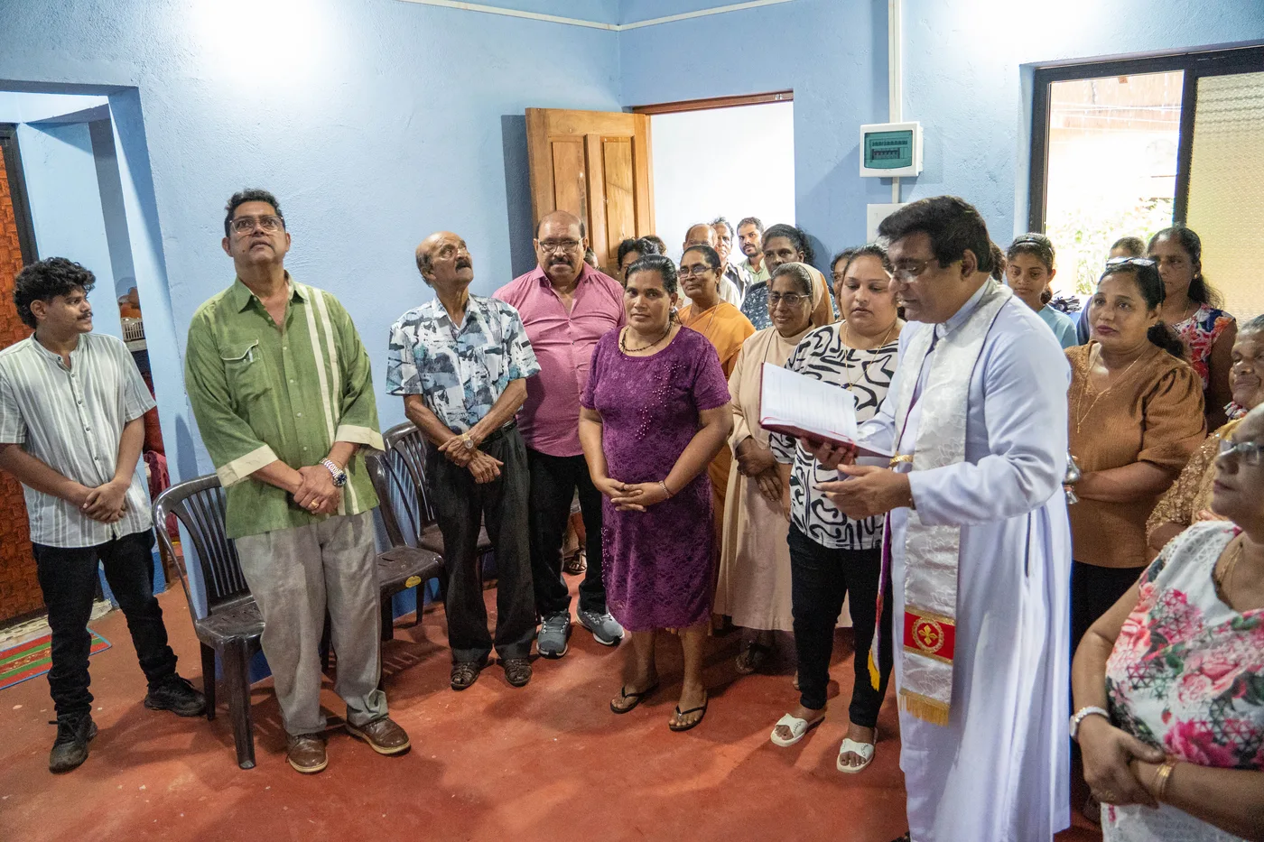 Ceremony and blessing of newly restored home